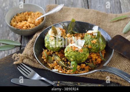 South Tyrolean spinach dumplings in a pan Stock Photo