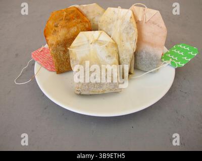 Dried tea bags for homemade organic plant fertiliser and more Stock Photo