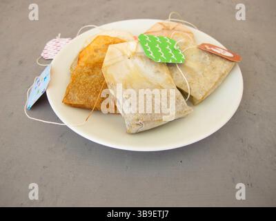 Dried tea bags for homemade organic plant fertiliser and more Stock Photo