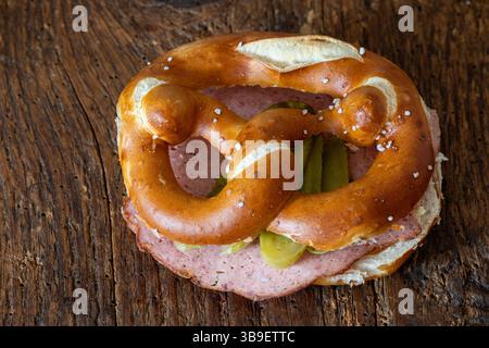 Liver loaf in a pretzel on wood Stock Photo