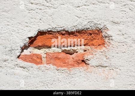 Crumbling plaster on a historical building Stock Photo
