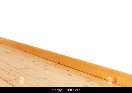 White wall with wooden floorboards and skirting board Stock Photo