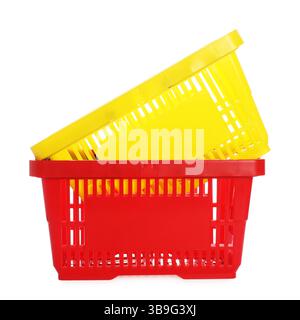 Stack of colorful shopping baskets isolated on white Stock Photo