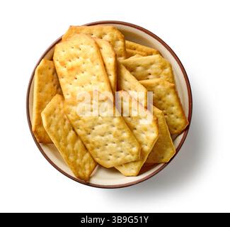 bowl of crackers isolated on white background, top view Stock Photo