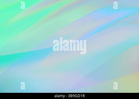 A soothing abstract design featuring soft pastel gradients in blue and green tones. The gentle flowing curves create a serene and calming visual exper Stock Photo