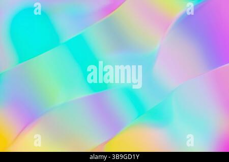 A vibrant pastel gradient background featuring smooth flowing curves in soft blues, pinks, and yellows. This abstract design creates a calming, dreamy Stock Photo