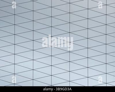 A gray surface featuring a modern geometric pattern composed of interconnected triangles. The design seamlessly blends simplicity with a sophisticated Stock Photo