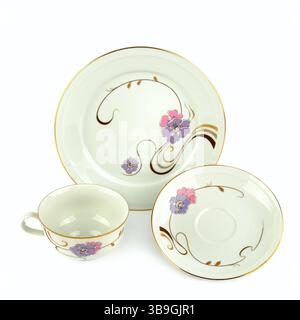Porcelain vintage cup and saucer isolated on white background. Vintage Bavarian teaware. Stock Photo
