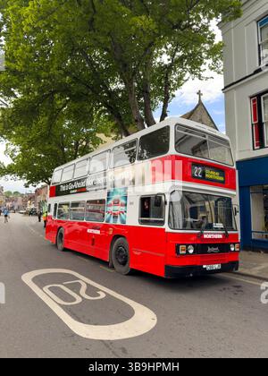 Winchester Hampshire England UK.05.05.2025. An old red and white double decker bus visiting Winchester on Bank Holiday. Stock Photo
