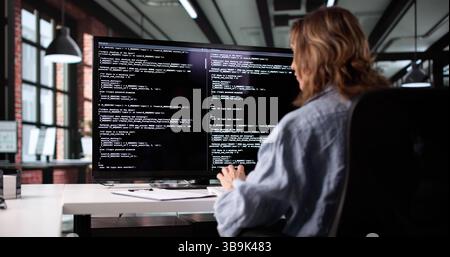 Female Web Developer Innovates Code On Computer In Mexico Office Stock Photo
