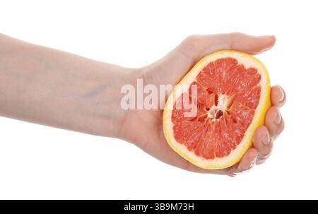 Woman squeezing grapefruit on white background, closeup Stock Photo
