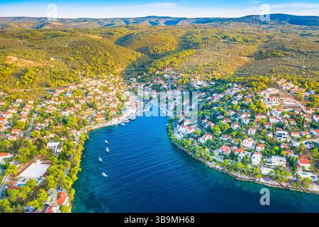 Aerial view of the coastal village of Splitska on Brac Island, Croatia, featuring a rugged and indented bay and traditional Dalmatian architecture Stock Photo
