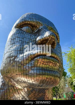 Face of Wigan metallic sculpture by Rick Kirby Stock Photo