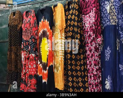 Display of colorful batik dress in traditional market Stock Photo