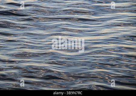 Small waves, clouds reflected on the sea surface, Baltic Sea Stock Photo