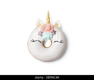 Unicorn donut isolated on white background. Trendy donut unicorn with white glaze. Top view or flat lay Stock Photo
