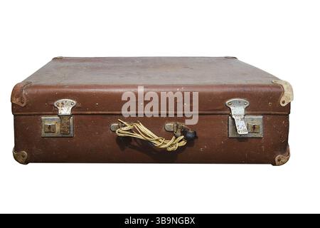 Old shabby suitcase without handle isolated on white background. An unnecessary broken and worn thing. Trash from the last century. Selective focus im Stock Photo
