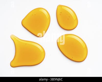 Honey drops. Honey for design elements. Abstract pattern from honey drops. Isolated on white with clipping path. Can use for design or text Stock Photo