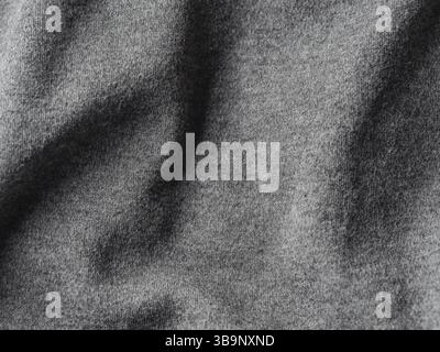 Gray cotton fabric texture. Clothes cotton jersey background with folds Stock Photo