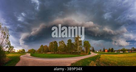Supercell, shelf, arcus storm clouds over the fields in summer Stock Photo