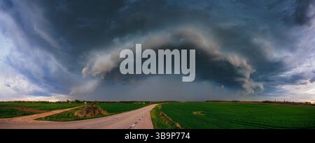 Supercell, shelf, arcus storm clouds over the fields in summer Stock Photo