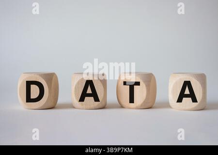 Data symbol. Concept word Data on wooden cubes. Beautiful white background. Business and Data concept. Copy space. Stock Photo