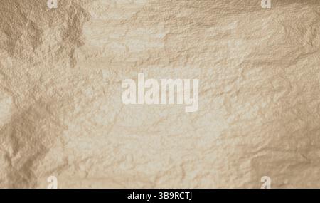 Beige foil with a soft, metallic texture creates a calm, elegant surface. Light beige tones and a golden tint reflect subtle shimmer, perfect for styl Stock Photo