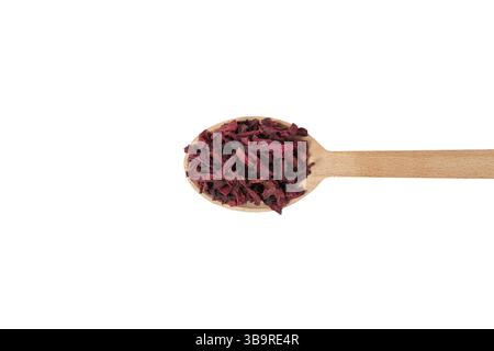 Dried beetroot slices on wooden spoon isolated on white background. Stock Photo