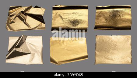 Torn and crumpled metallic foil with textured surface, golden and bronze tones, edgy jagged edges, fine glitter and shimmering finish, a rich, preciou Stock Photo