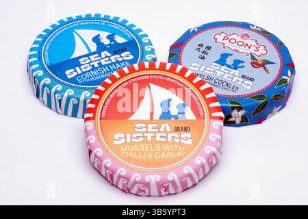 Three Tins of Sea Sisters Brand  British Conservas Seafood on a white background Stock Photo
