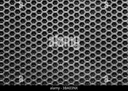 Metal grid texture pattern. Industrial hexagon surface. Steel ventilation grille closeup. Technical honeycomb structure. Grunge mechanical background. Stock Photo