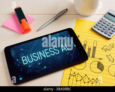 Using generative AI in business practices. Digital tablet showing business ai concept on screen surrounded by office supplies. Stock Photo