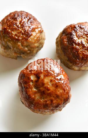 Cutlets from minced meat on white background. Close up view Stock Photo
