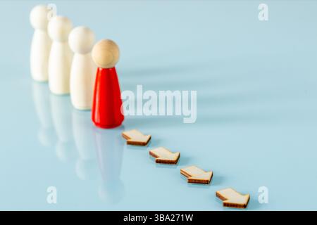 A leader leads a team towards a goal. Business concept Stock Photo