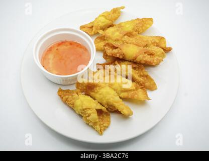 Deep Fried Won ton on white plate with dip source Stock Photo