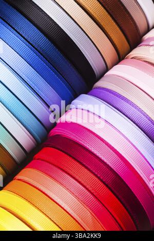 The various colors ribbon bobbins close up Stock Photo