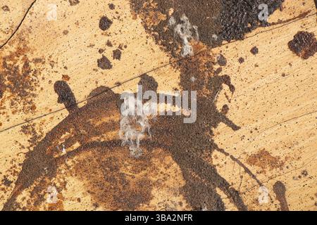 Dirty paint stains on wooden surface as background, paint on table Stock Photo