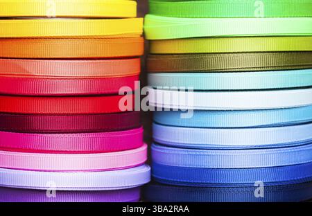 The various colors ribbon bobbins close up Stock Photo