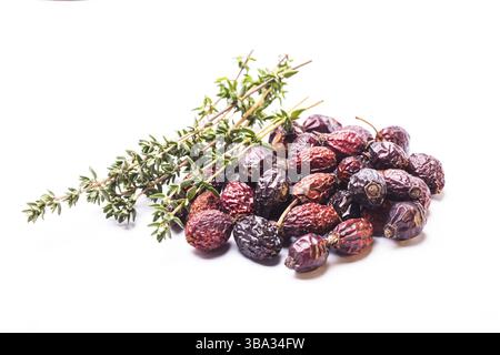 A pile berries of dried rosehips isolated on white Stock Photo