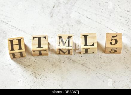 Five wooden cubes with word HTML5 on white stone like board, view from above, Liptovsky Hradok, Slovakia, Europe Stock Photo
