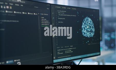 PC displays in data center providing computing resources for artificial intelligence processing massive datasets for training. Close up of code lines on computer in server room for machine learning Stock Photo