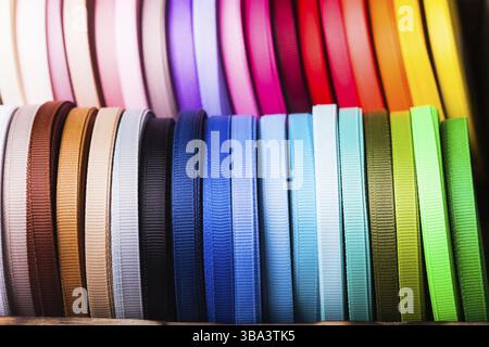 The various colors ribbon bobbins close up Stock Photo