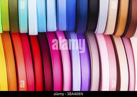 The various colors ribbon bobbins close up Stock Photo