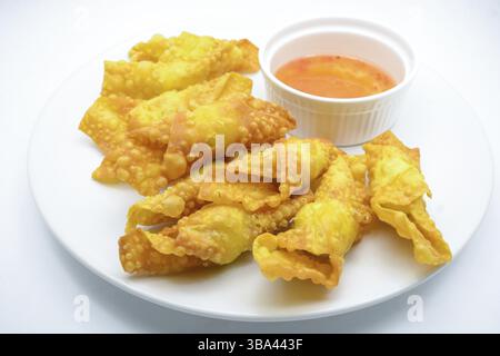 Deep Fried Won ton on white plate with dip source Stock Photo