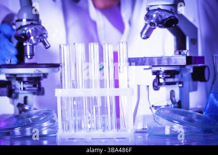 Two scientists in the chemical laboratory are doing experiments Stock Photo