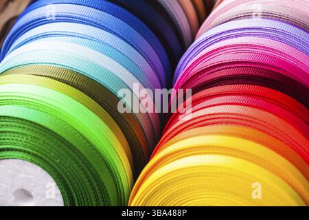 The various colors ribbon bobbins close up Stock Photo