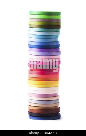 Various colors ribbon bobbins isolated on white Stock Photo