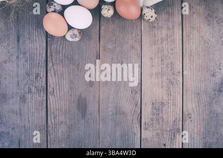 Eggs on the rustic wooden table with copy space Stock Photo