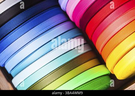 The various colors ribbon bobbins close up Stock Photo