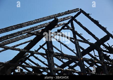 A building with a black roof and black beams Stock Photo